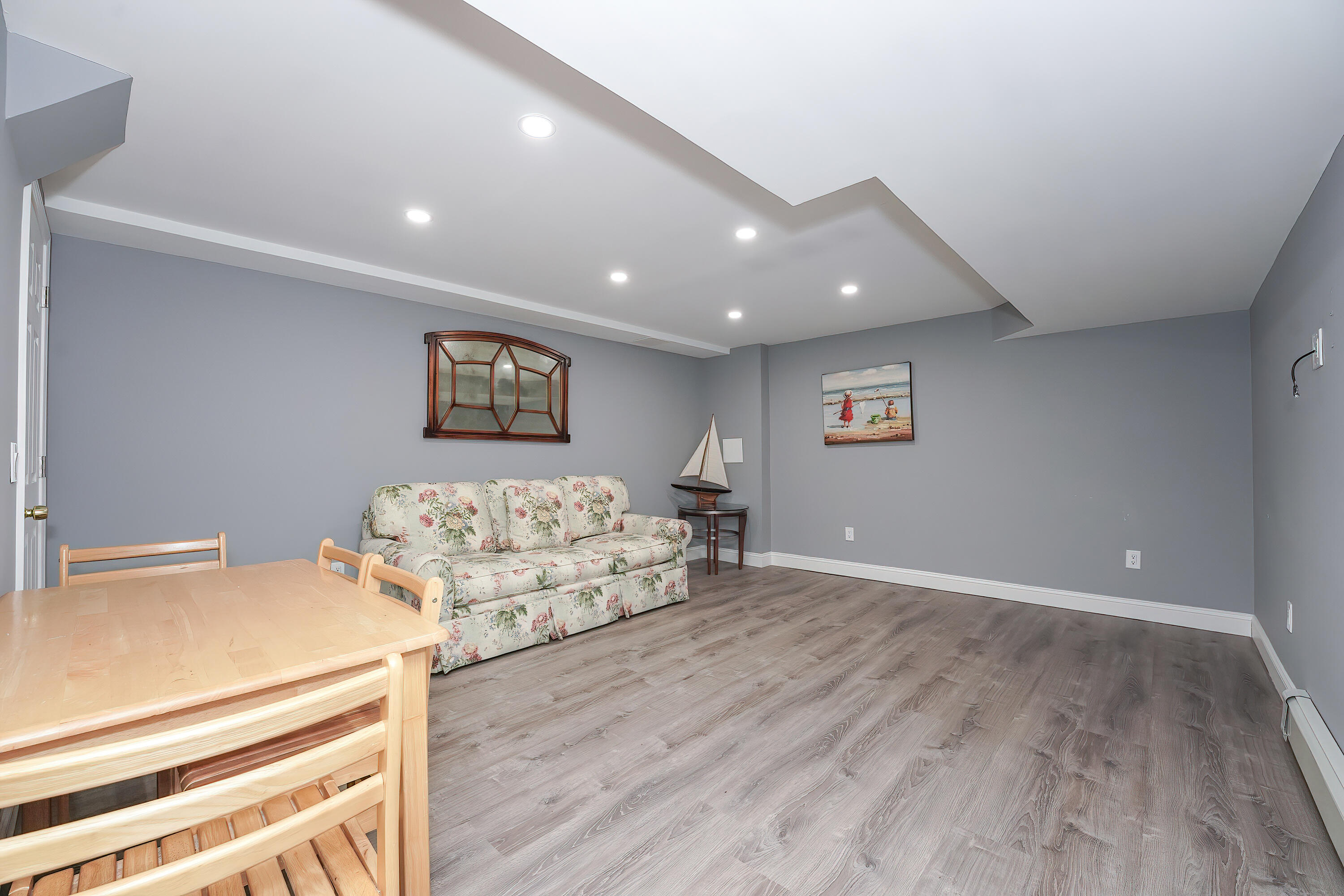 240 Oak Street West Barnstable, MA 02668 - Photo 58 of 89 a living room with furniture and wooden floor