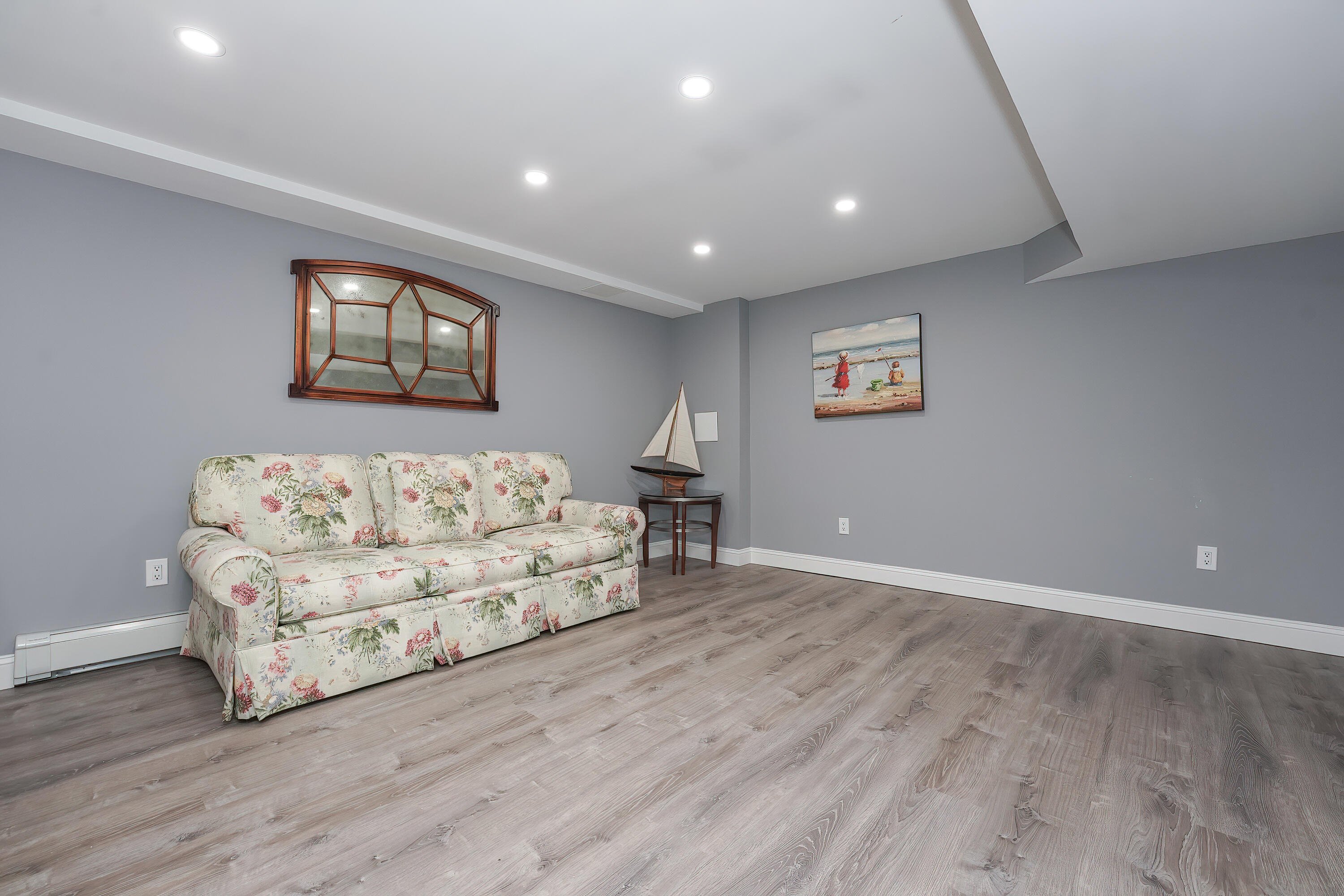 240 Oak Street West Barnstable, MA 02668 - Photo 59 of 89 a living room with furniture and wooden floor