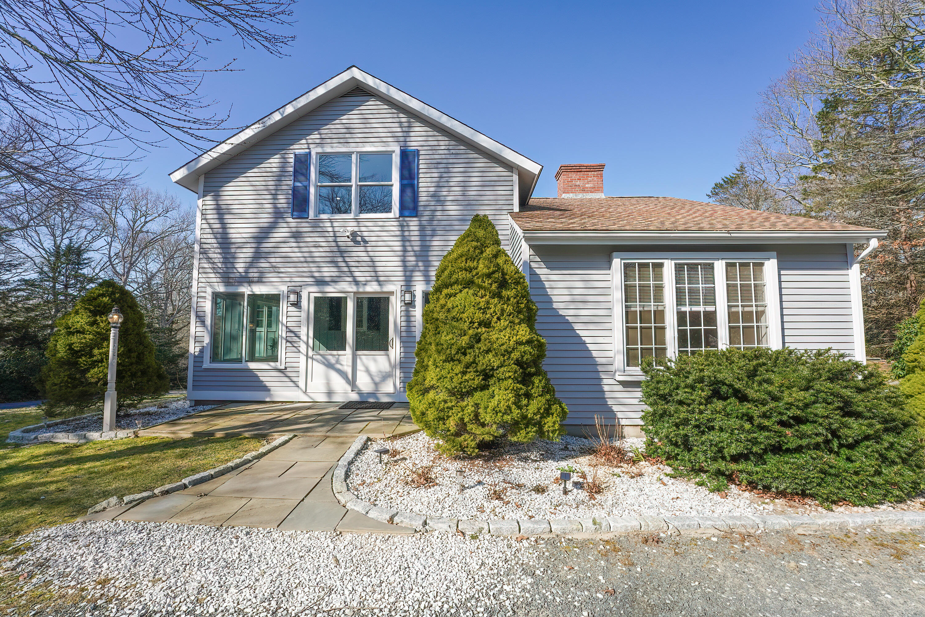 240 Oak Street West Barnstable, MA 02668 - Photo 73 of 89 a front view of a house with garden