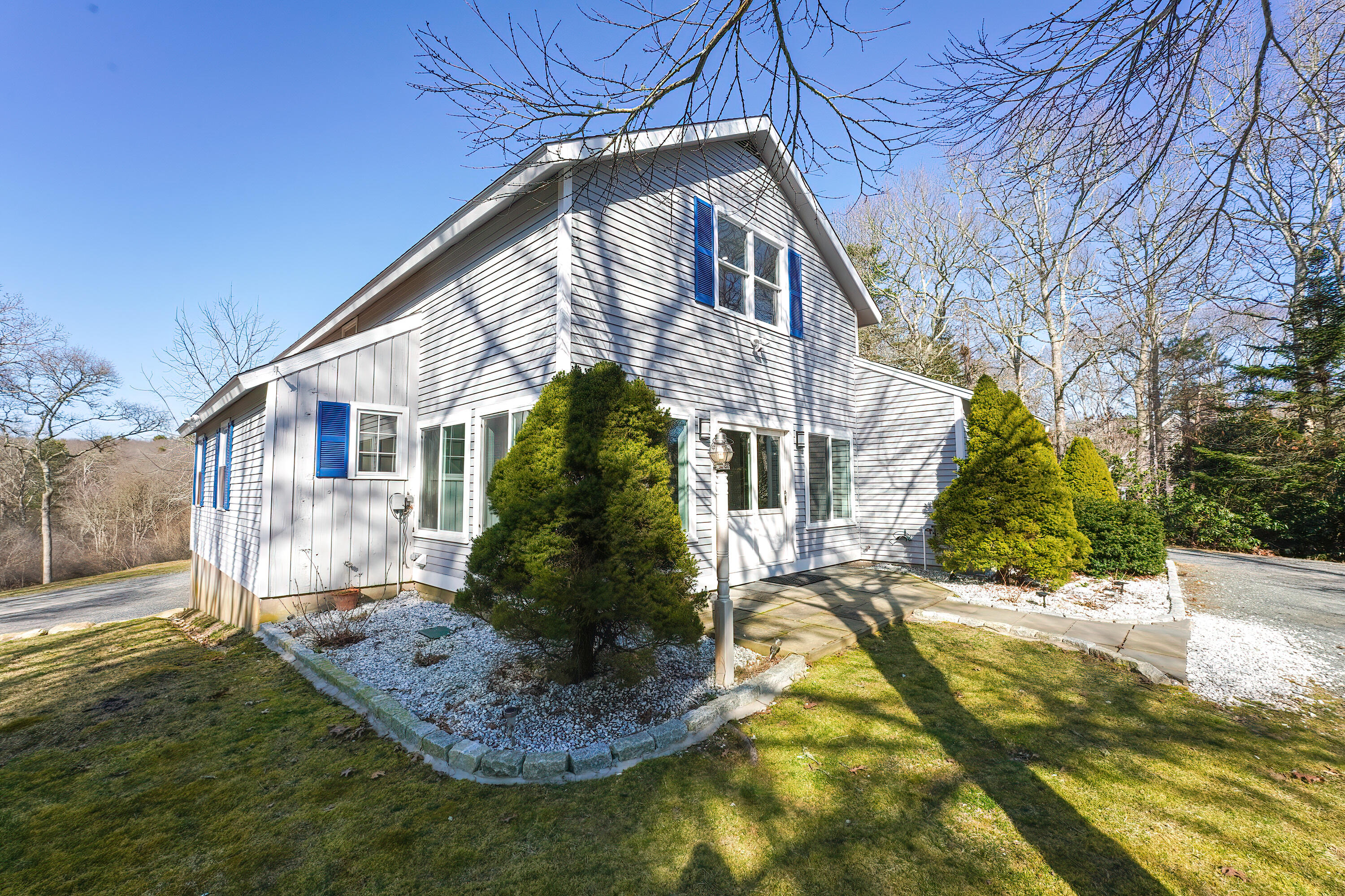 240 Oak Street West Barnstable, MA 02668 - Photo 75 of 89 a front view of a house with a yard
