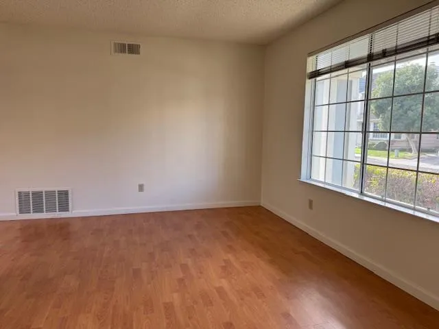 an empty room with windows
