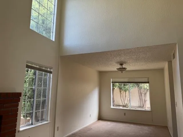 a kitchen with stainless steel appliances a sink stove and refrigerator