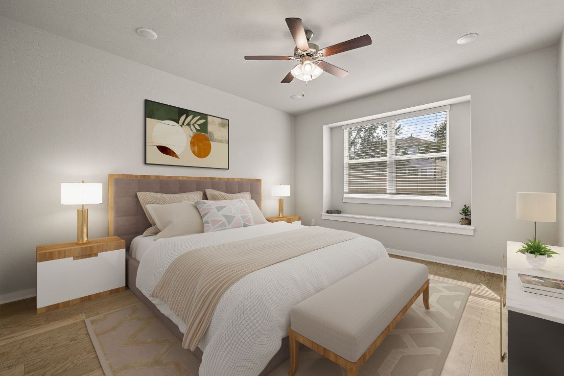 Virtually Staged - The primary suite on the main level provides the fortunate new owners with a serene and private space.