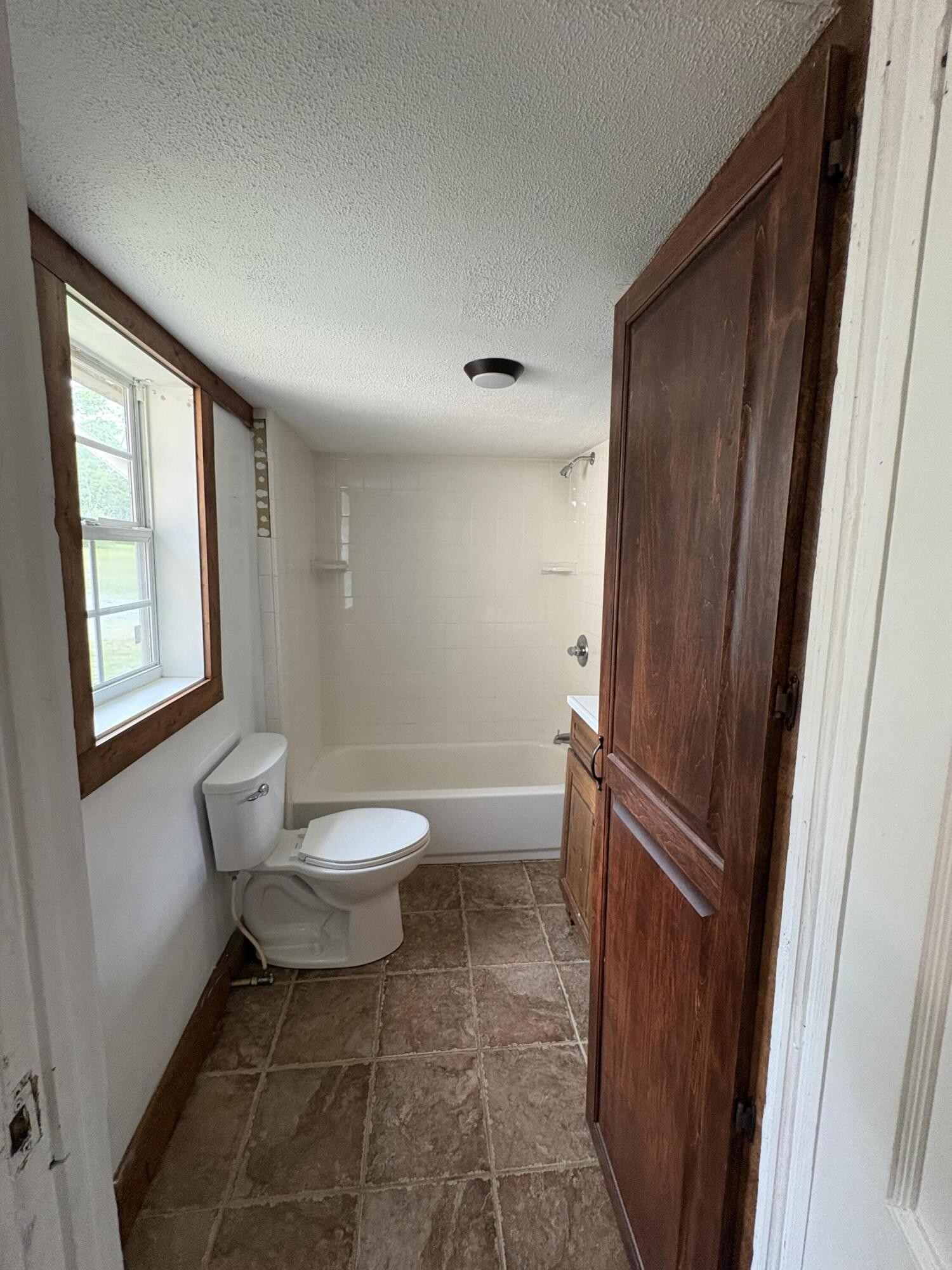 1117 Bledsoe Road Etowah, TN 37331 - Photo 16 of 16 a bathroom with a toilet a sink and a mirror