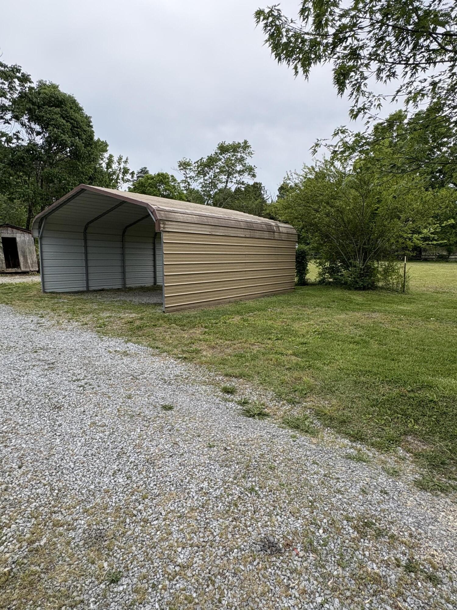 1117 Bledsoe Road Etowah, TN 37331 - Photo 3 of 16 a view of a backyard of the house