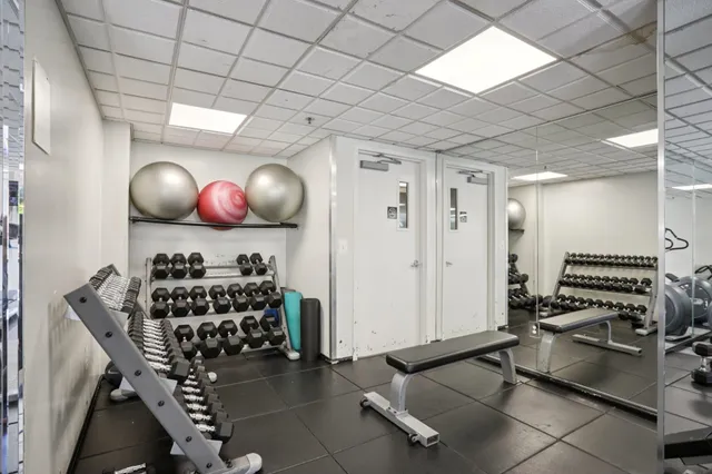 a swimming pool view with a outdoor seating
