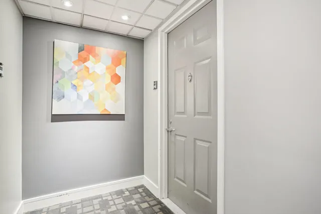 a view of an empty room and window