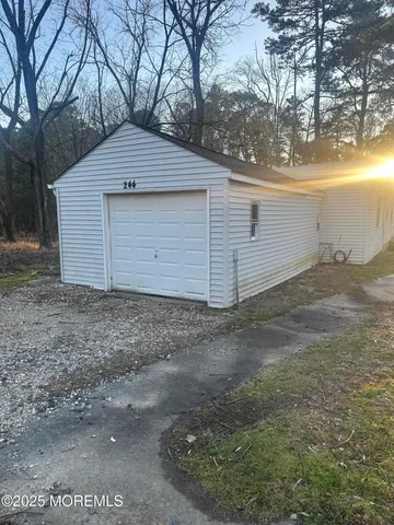 a view of a backyard with a barn