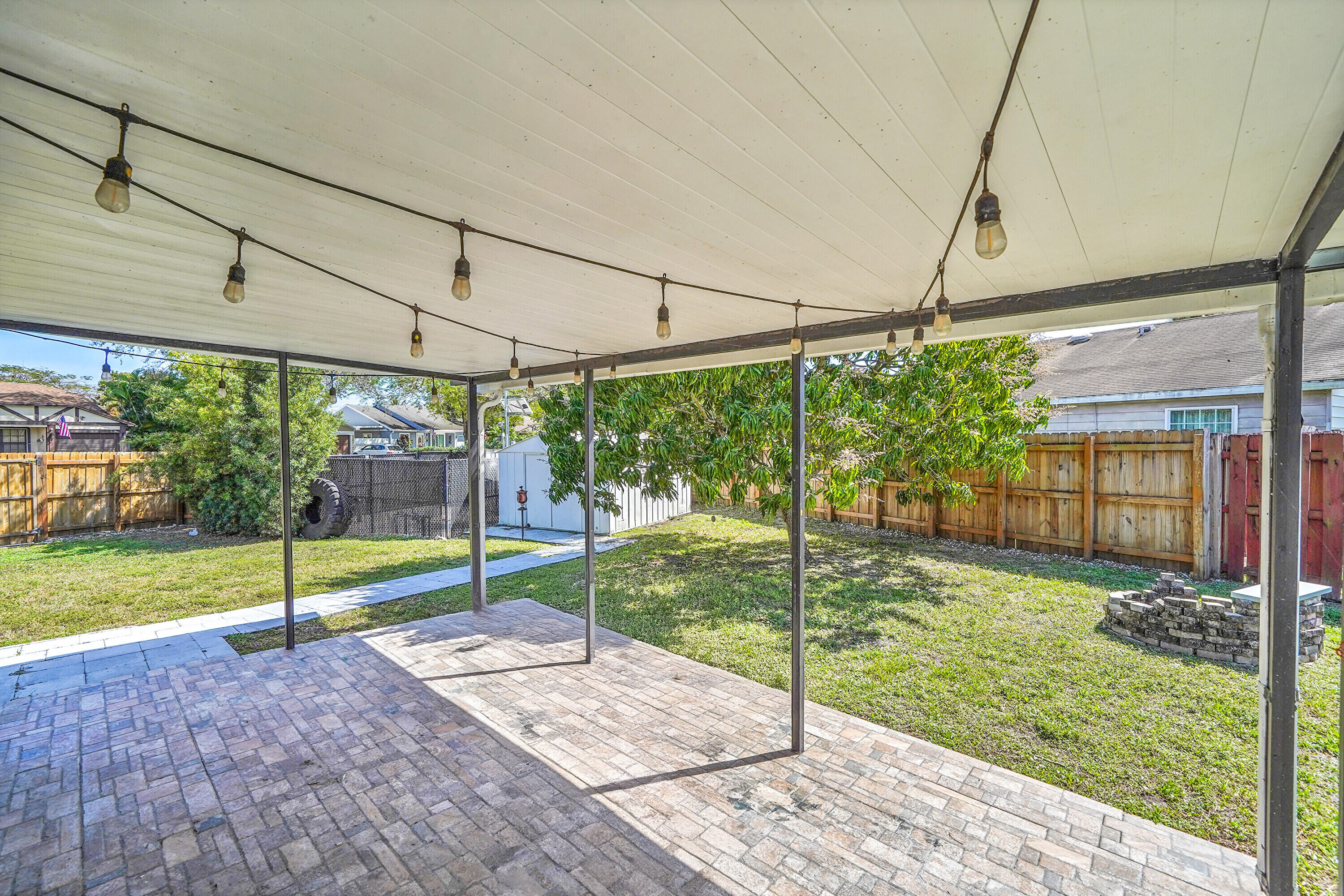 11120 North Terradas Lane Boca Raton, FL 33428 - Photo 31 of 57 a view of a backyard