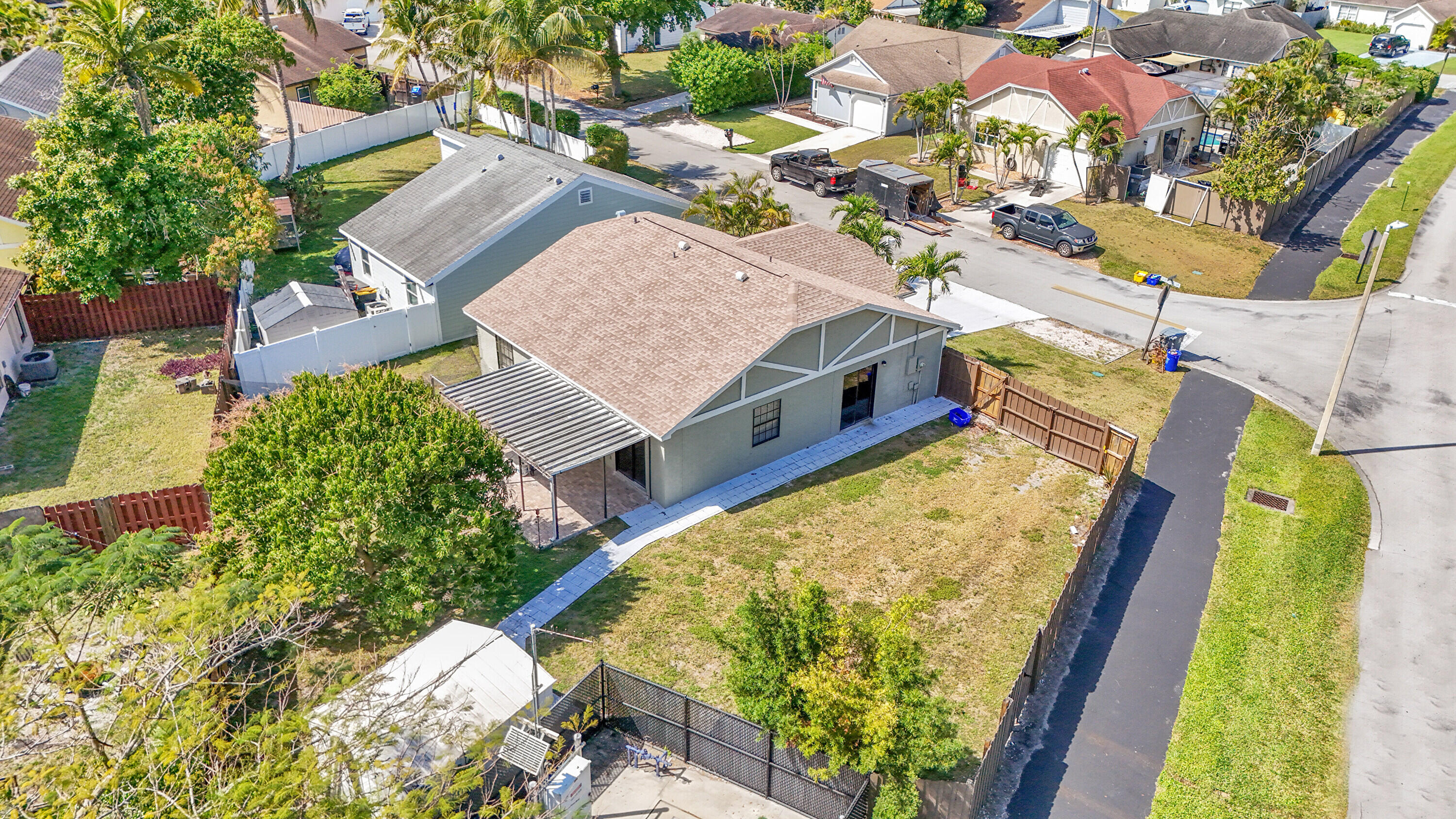 11120 North Terradas Lane Boca Raton, FL 33428 - Photo 39 of 57 an aerial view of a house with a swimming pool and outdoor seating