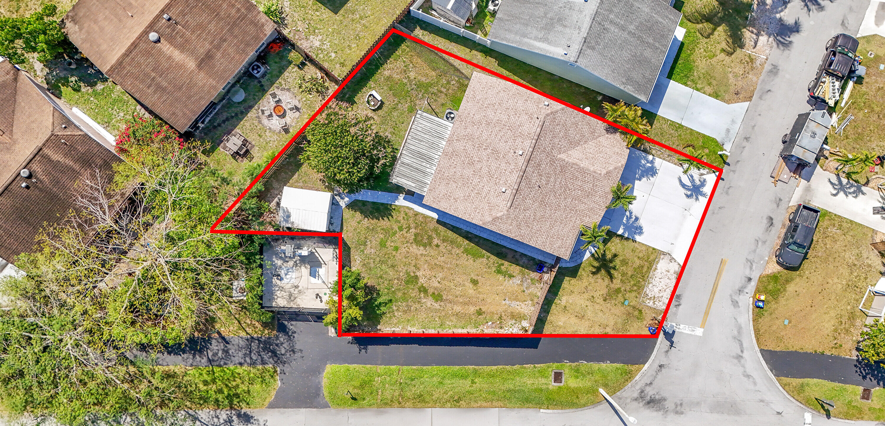 11120 North Terradas Lane Boca Raton, FL 33428 - Photo 40 of 57 an aerial view of a house with a yard and outdoor seating