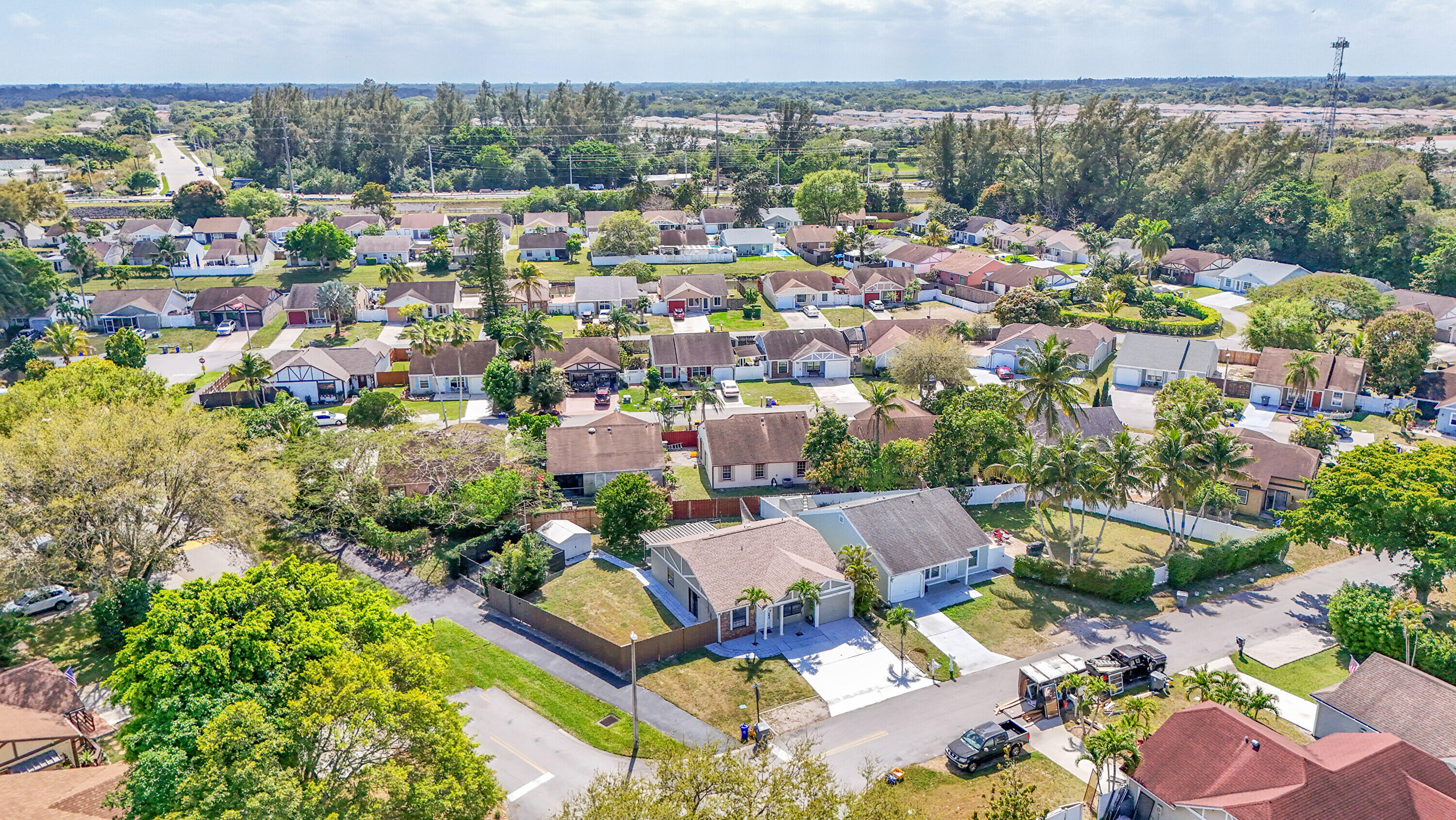 11120 North Terradas Lane Boca Raton, FL 33428 - Photo 43 of 57 an aerial view of residential houses with outdoor space and swimming pool