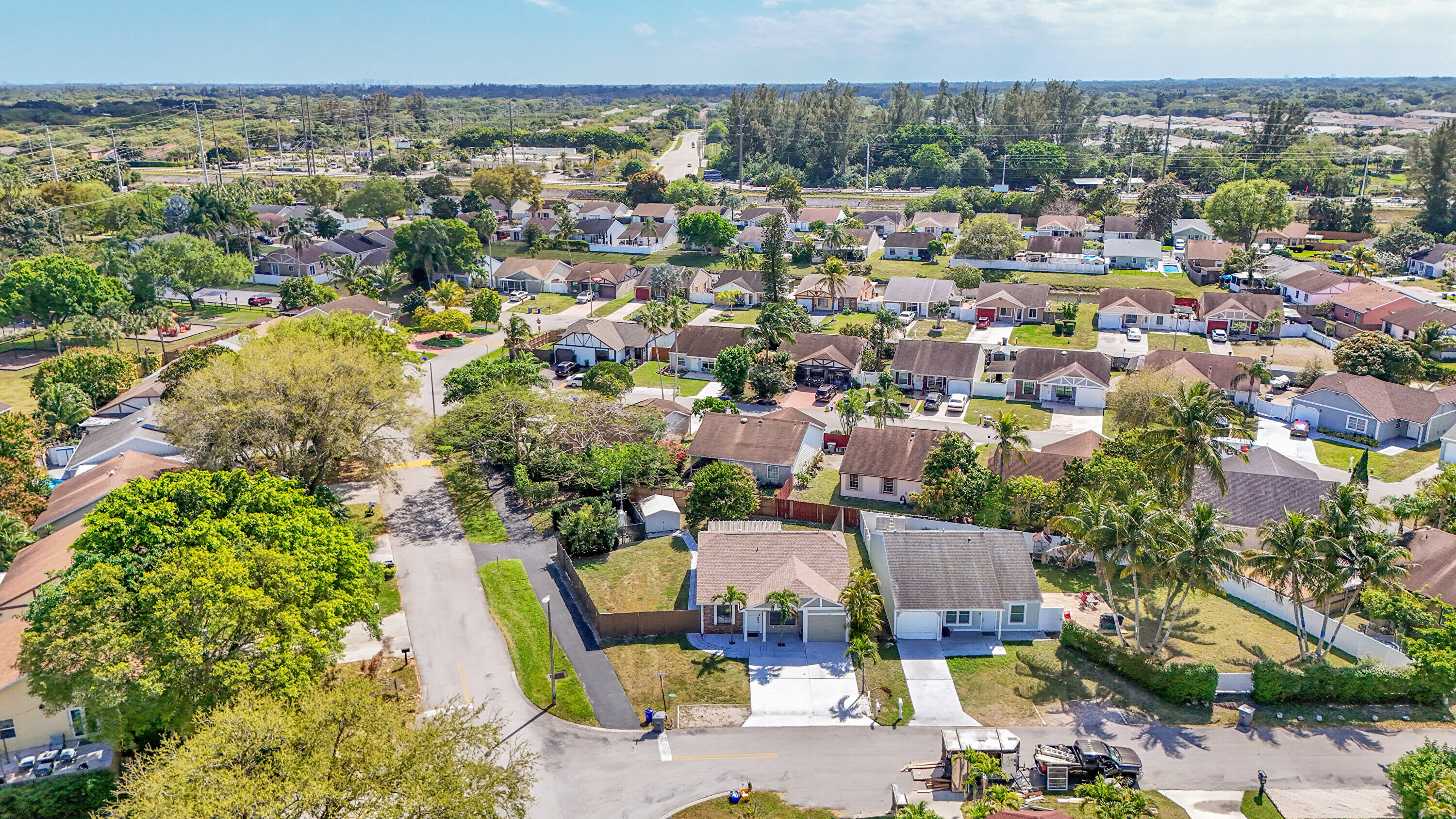 11120 North Terradas Lane Boca Raton, FL 33428 - Photo 44 of 57 an aerial view of a houses with a swimming pool