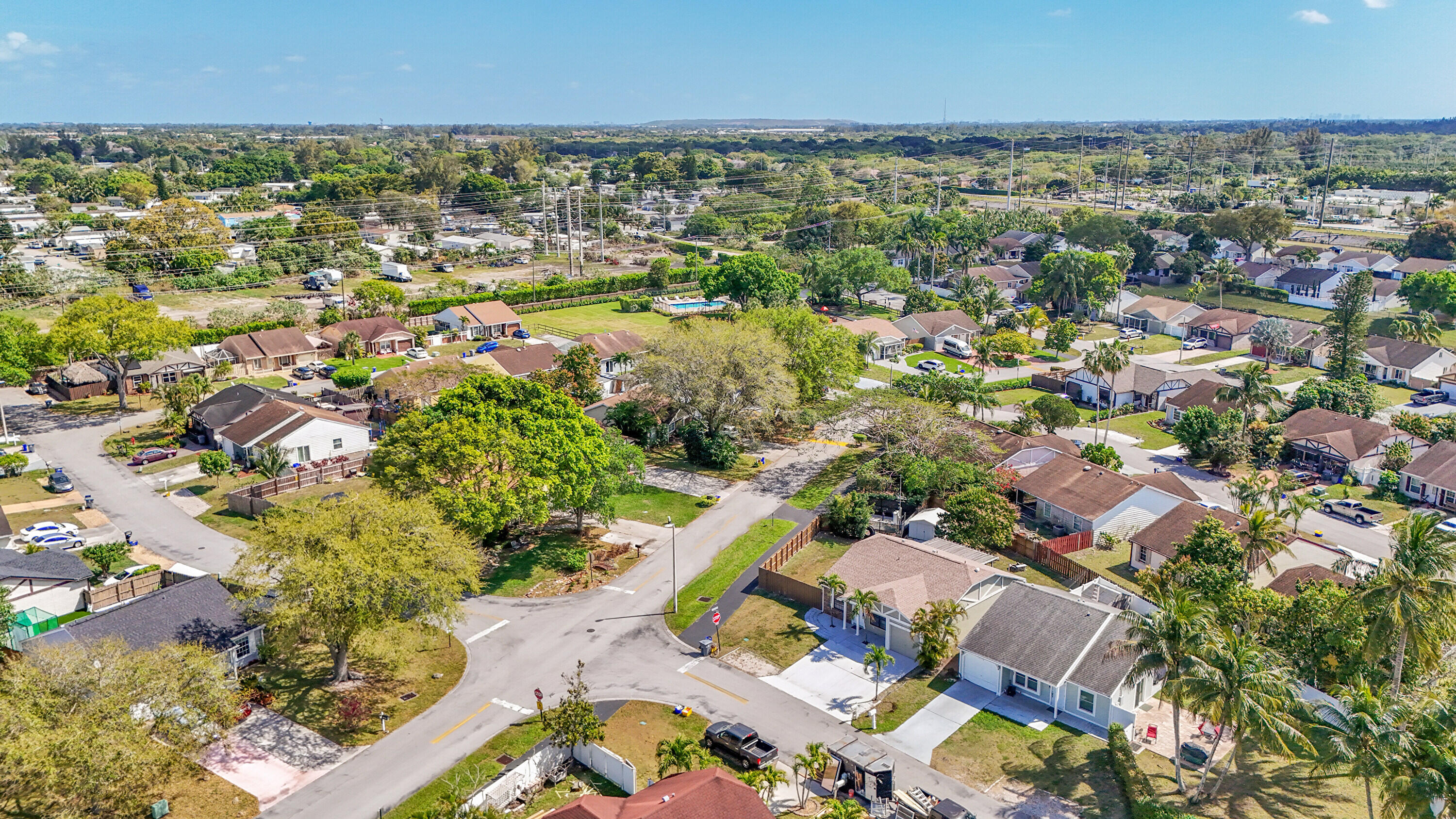 11120 North Terradas Lane Boca Raton, FL 33428 - Photo 47 of 57 an aerial view of residential houses with outdoor space