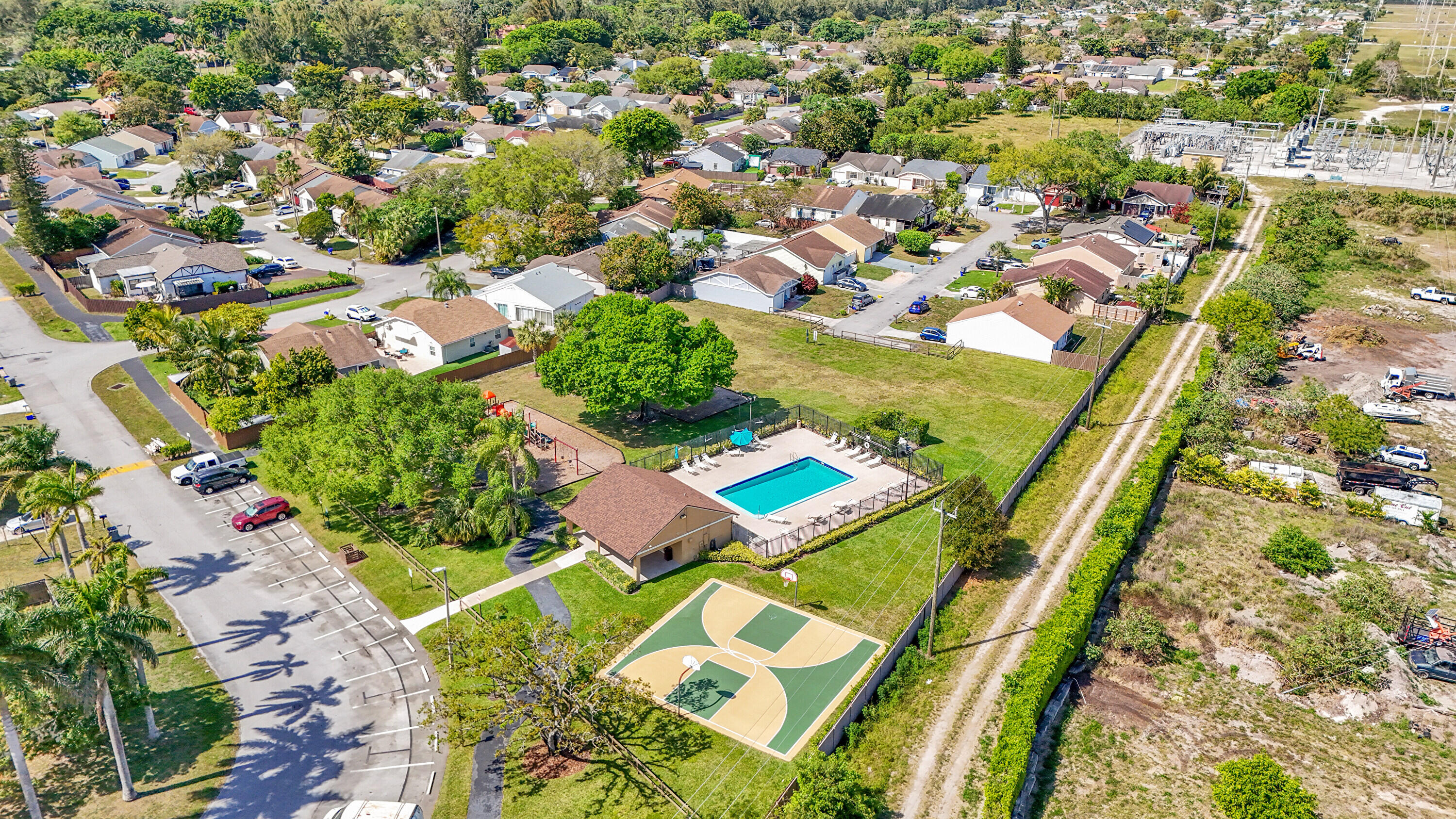 11120 North Terradas Lane Boca Raton, FL 33428 - Photo 52 of 57 an aerial view of residential houses with outdoor space