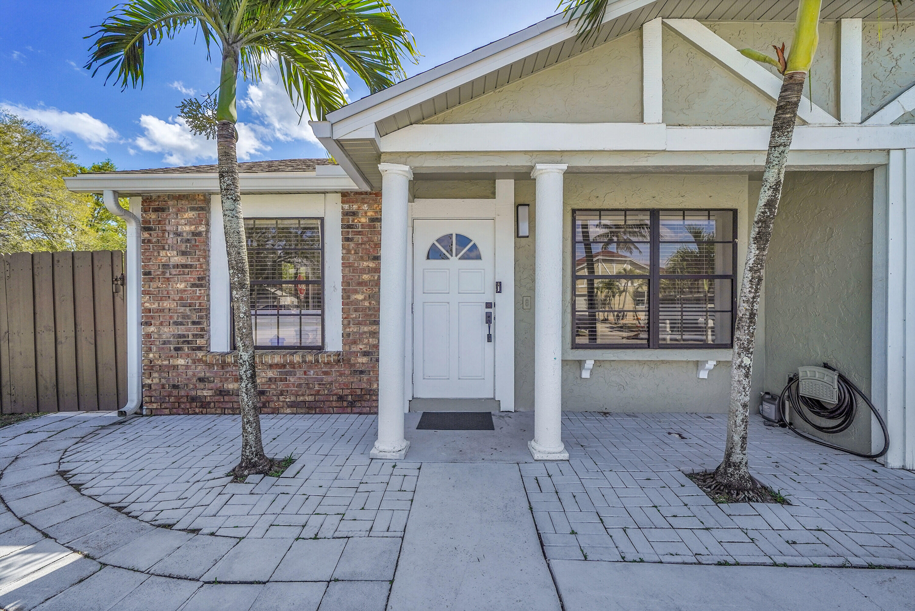 11120 North Terradas Lane Boca Raton, FL 33428 - Photo 6 of 57 a front view of a house
