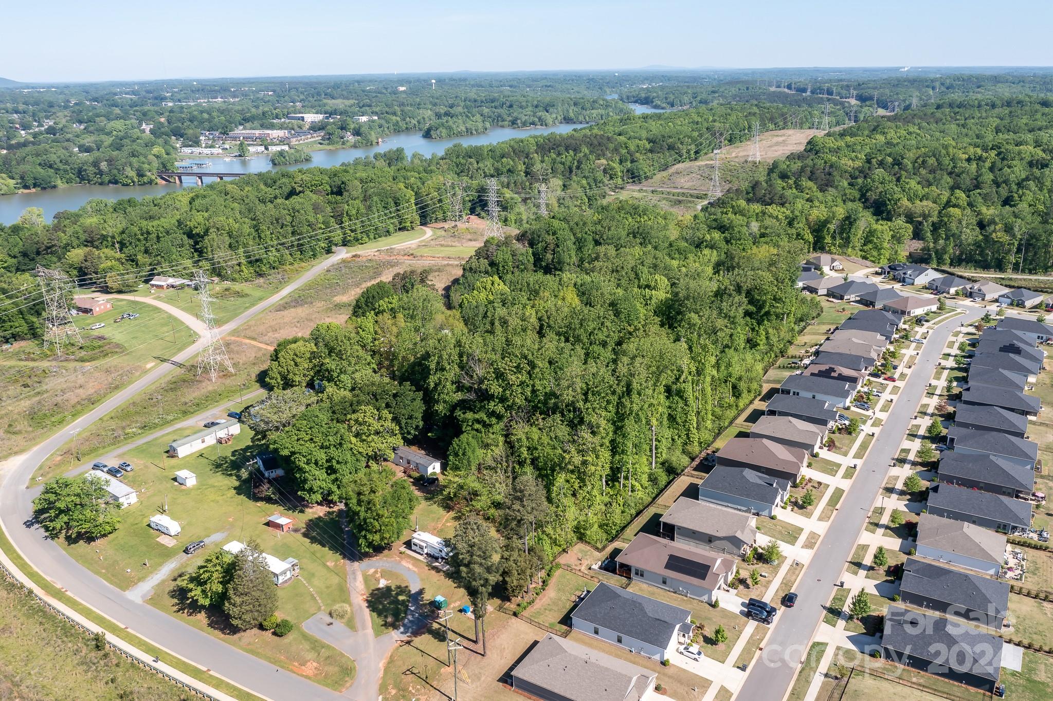 4650 Bright Road Charlotte, NC 28214 - Photo 1 of 16 an aerial view of residential houses with outdoor space