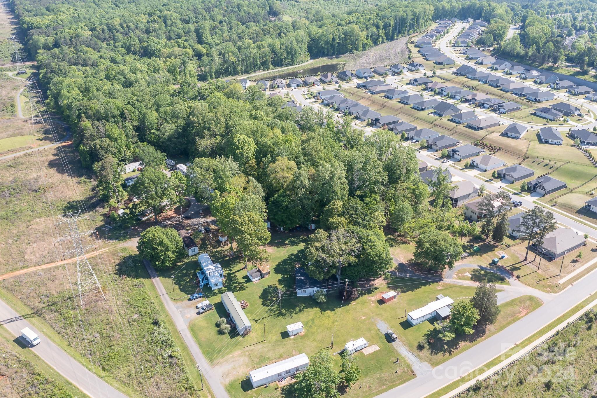 4650 Bright Road Charlotte, NC 28214 - Photo 6 of 16 a view of a yard with plants
