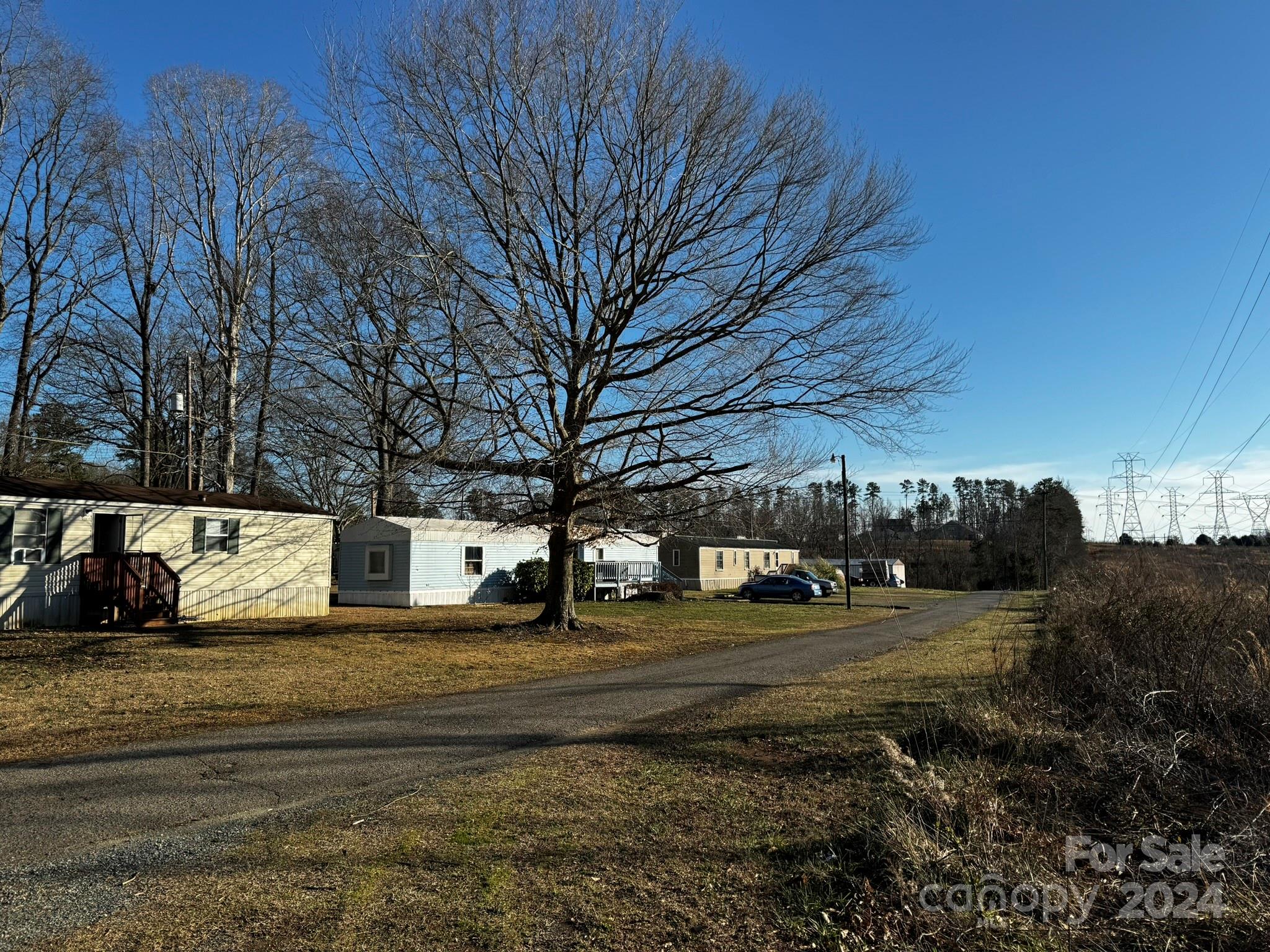 4650 Bright Road Charlotte, NC 28214 - Photo 7 of 16 a view of road with card parked