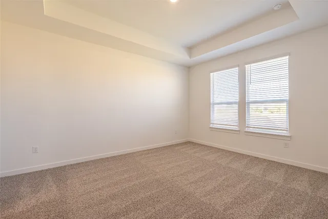a view of a kitchen with a sink and wooden floor