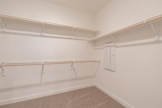a bathroom with a double vanity sink mirror and shower