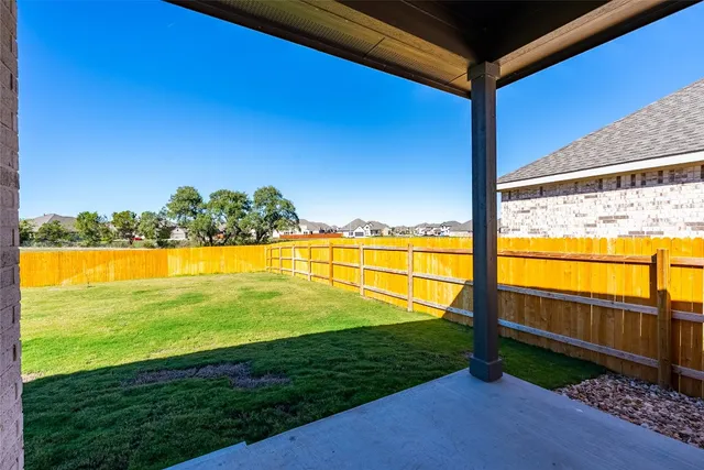 a house view with swimming pool