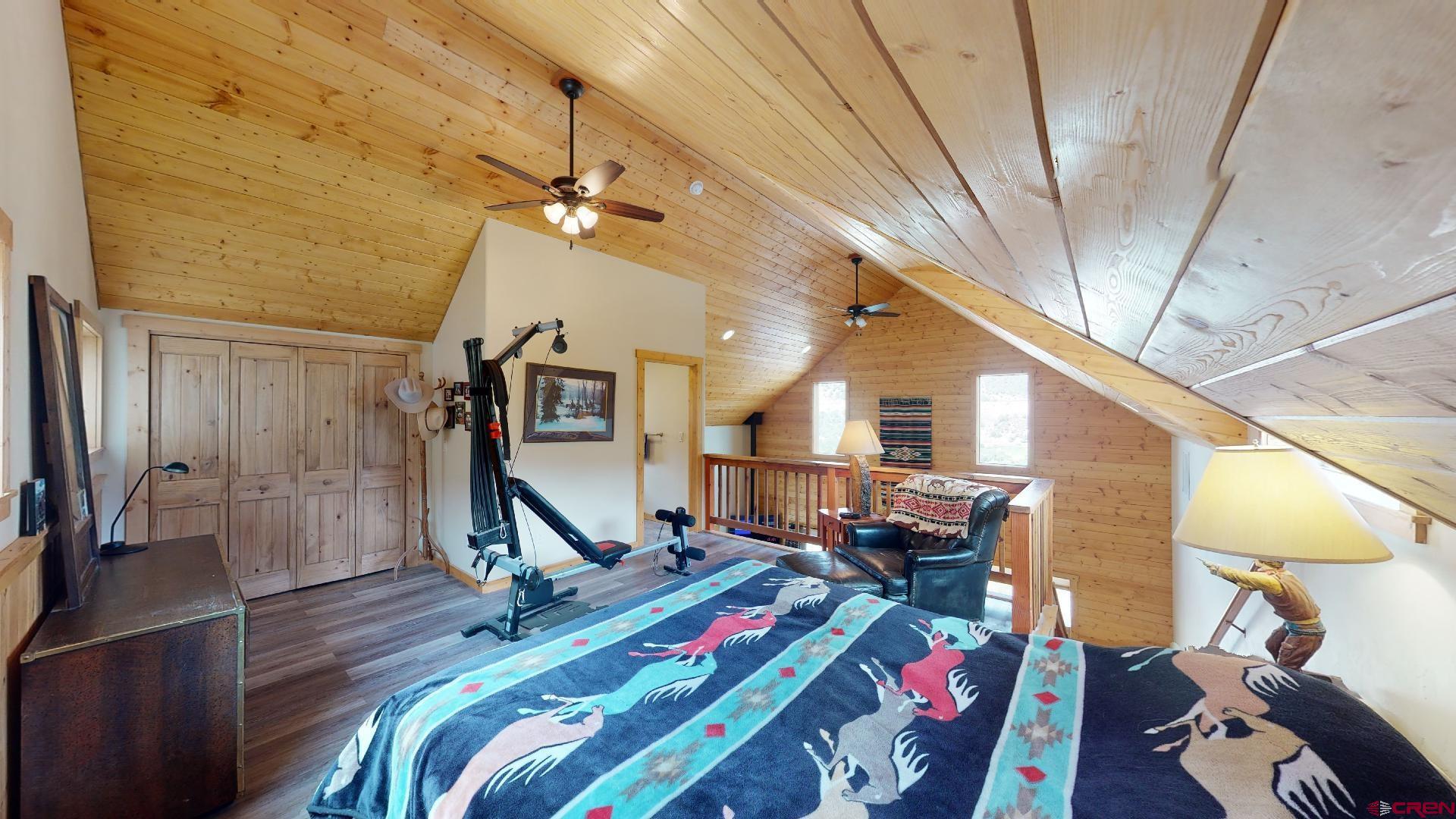 16800 Grange Road Paonia, CO 81428 - Photo 11 of 37 a living room with furniture and a wooden floor