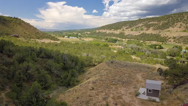 a view of a city with mountains in the background