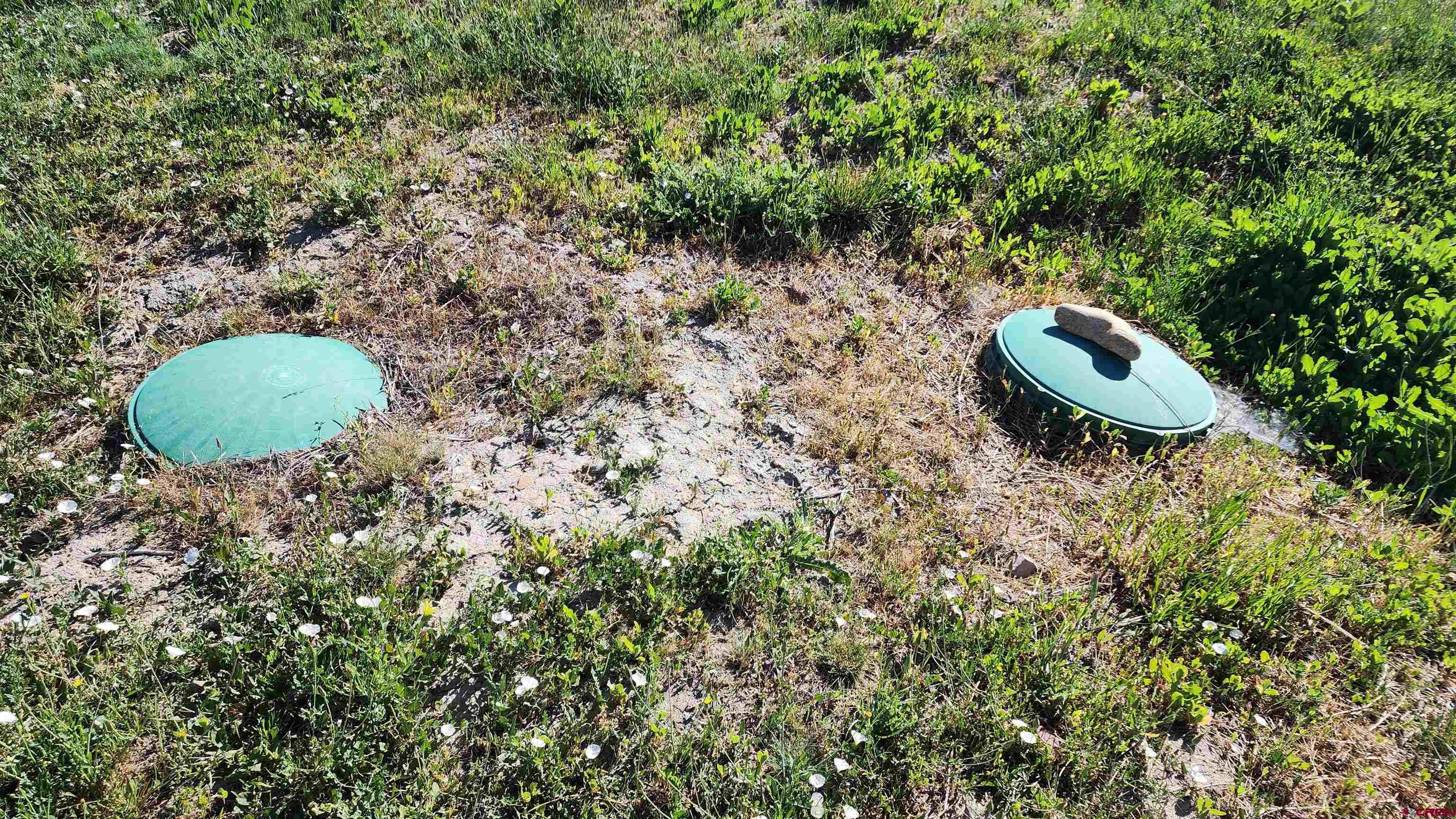 16800 Grange Road Paonia, CO 81428 - Photo 28 of 37 a backyard of a house with a yard and outdoor seating