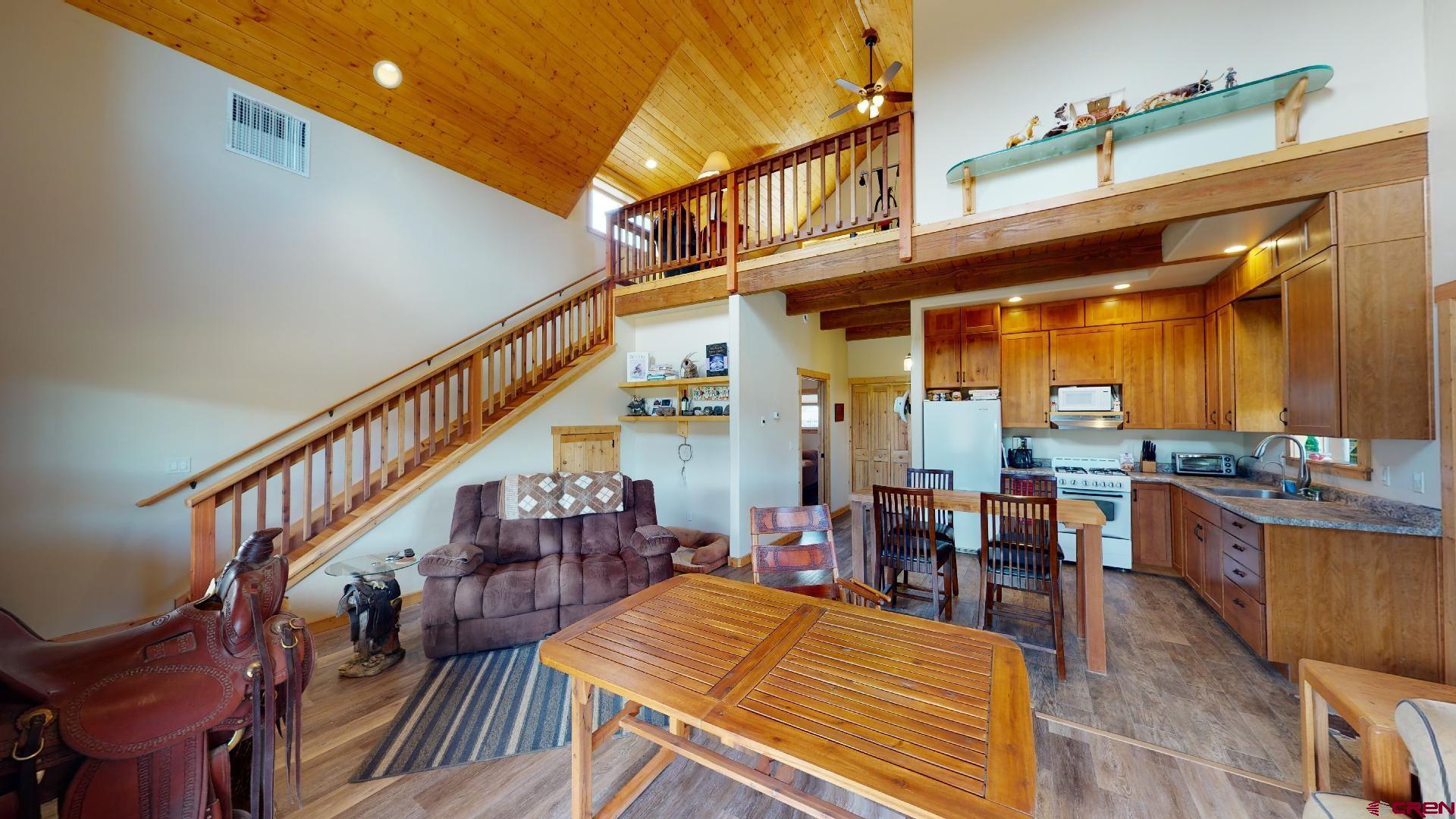 16800 Grange Road Paonia, CO 81428 - Photo 5 of 37 a view of a dining room with furniture window and plants