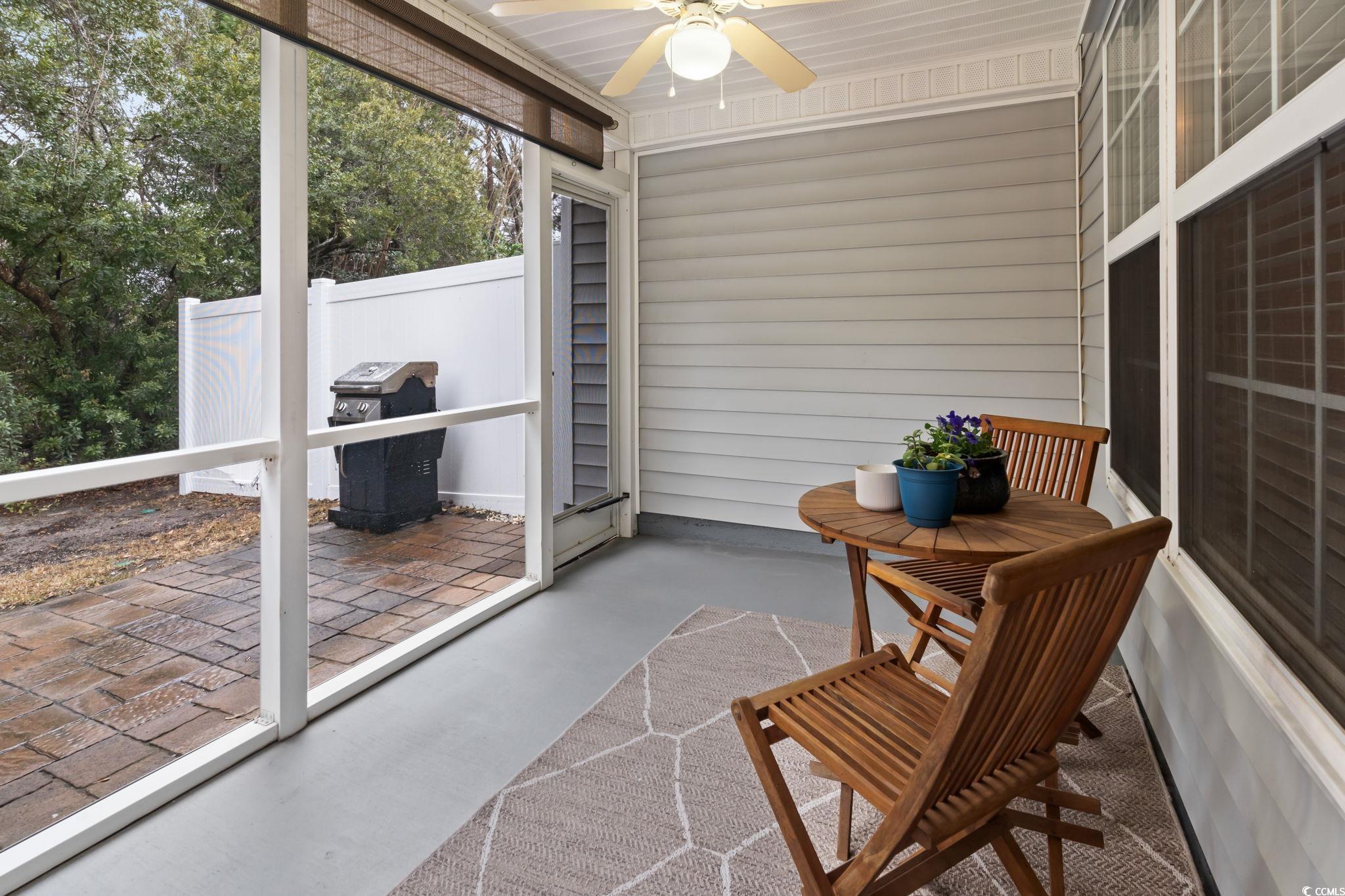 1024 Stanton PI, Unit 1024 Myrtle Beach, SC 29579 - Photo 21 of 26 Sunroom with ceiling fan