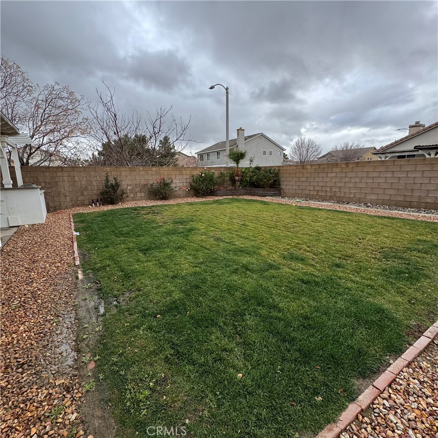 44528 Camolin Lane Lancaster, CA 93534 - Photo 11 of 75 a fire hydrant in the middle of a field