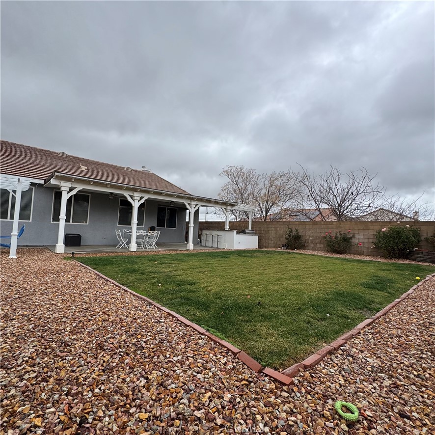 44528 Camolin Lane Lancaster, CA 93534 - Photo 13 of 75 front view of a house with a yard