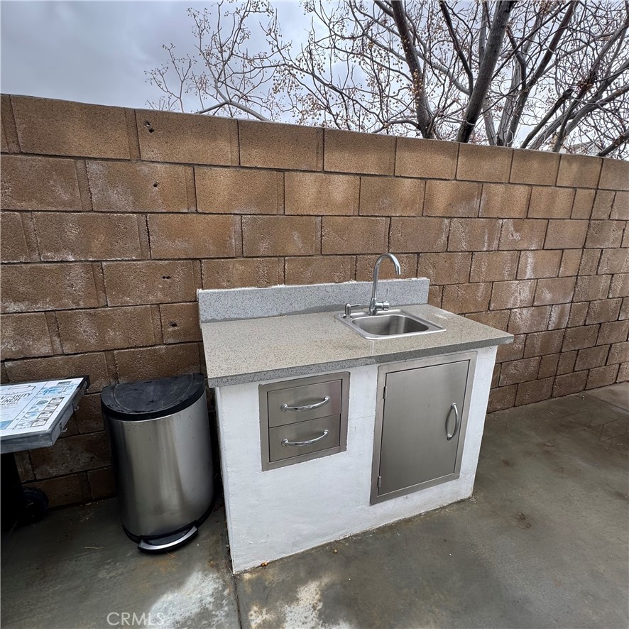 44528 Camolin Lane Lancaster, CA 93534 - Photo 16 of 75 a utility room with dryer and washer