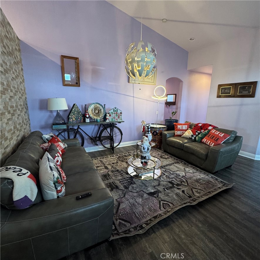 44528 Camolin Lane Lancaster, CA 93534 - Photo 21 of 75 a living room with furniture and painting on the wall