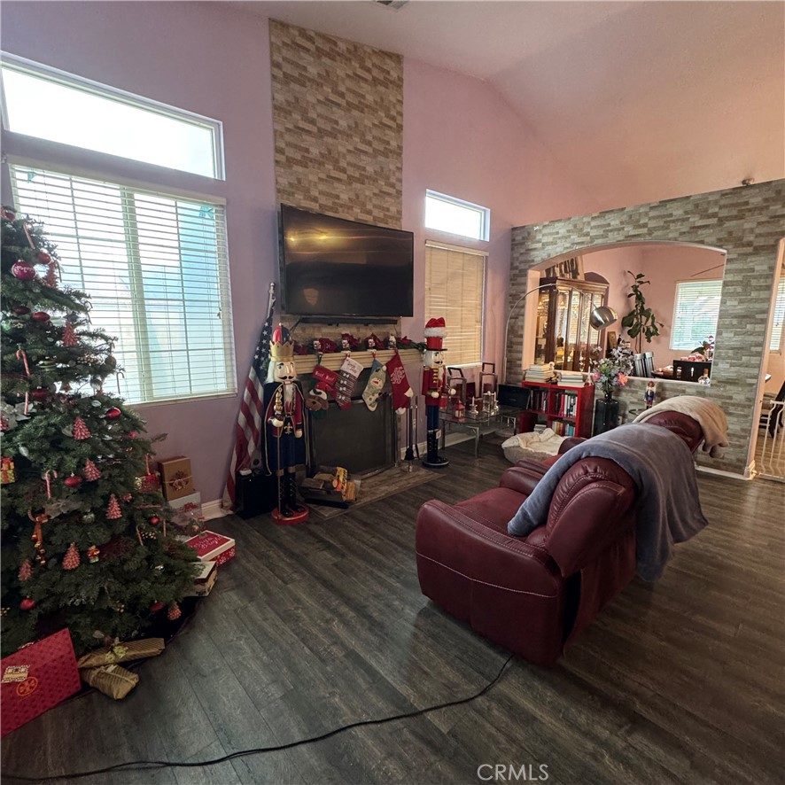 44528 Camolin Lane Lancaster, CA 93534 - Photo 22 of 75 a living room with furniture and a flat screen tv