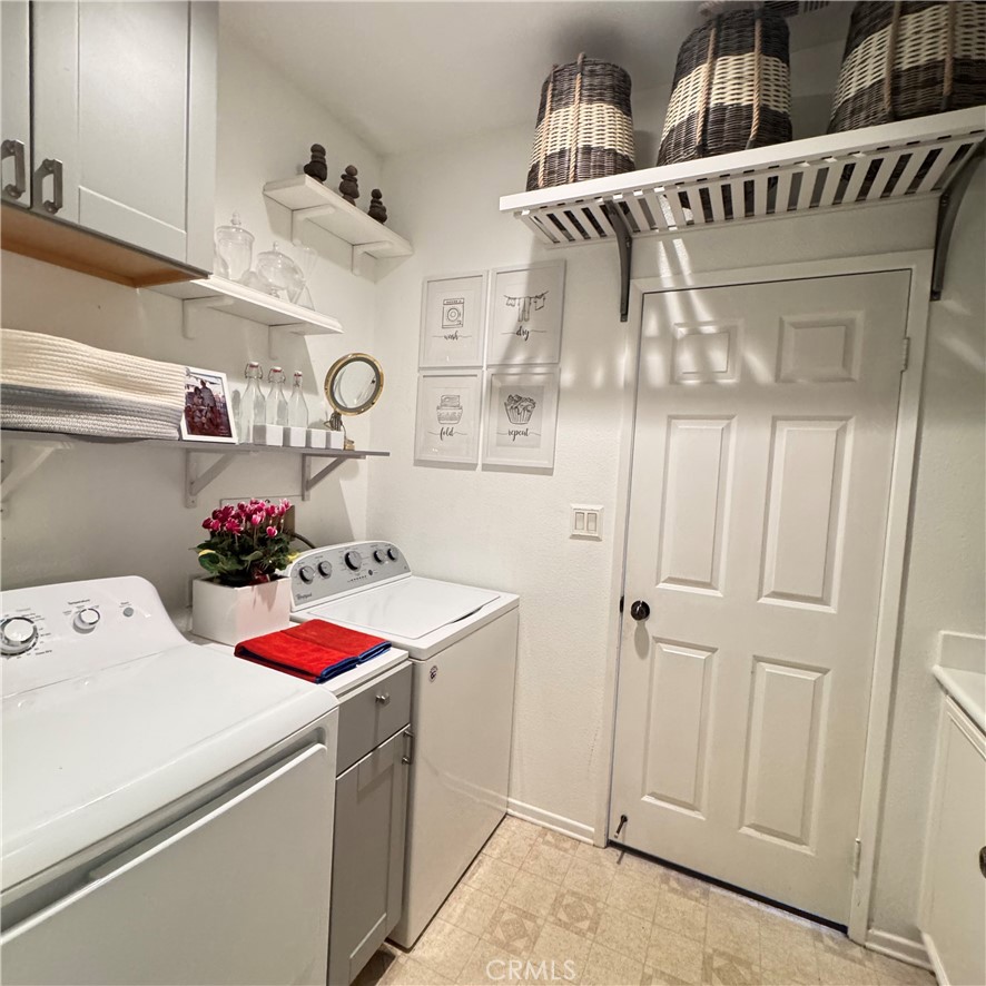 44528 Camolin Lane Lancaster, CA 93534 - Photo 34 of 75 a utility room with dryer and washer
