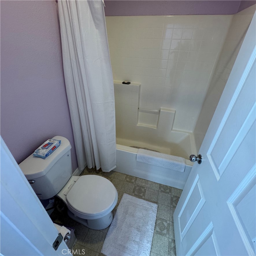 44528 Camolin Lane Lancaster, CA 93534 - Photo 40 of 75 a white toilet sitting next to a sink
