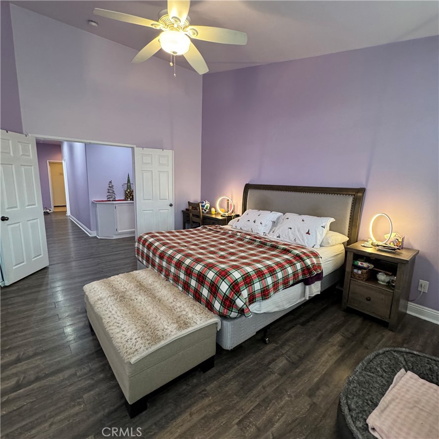 44528 Camolin Lane Lancaster, CA 93534 - Photo 59 of 75 a bedroom with a bed and wooden floor