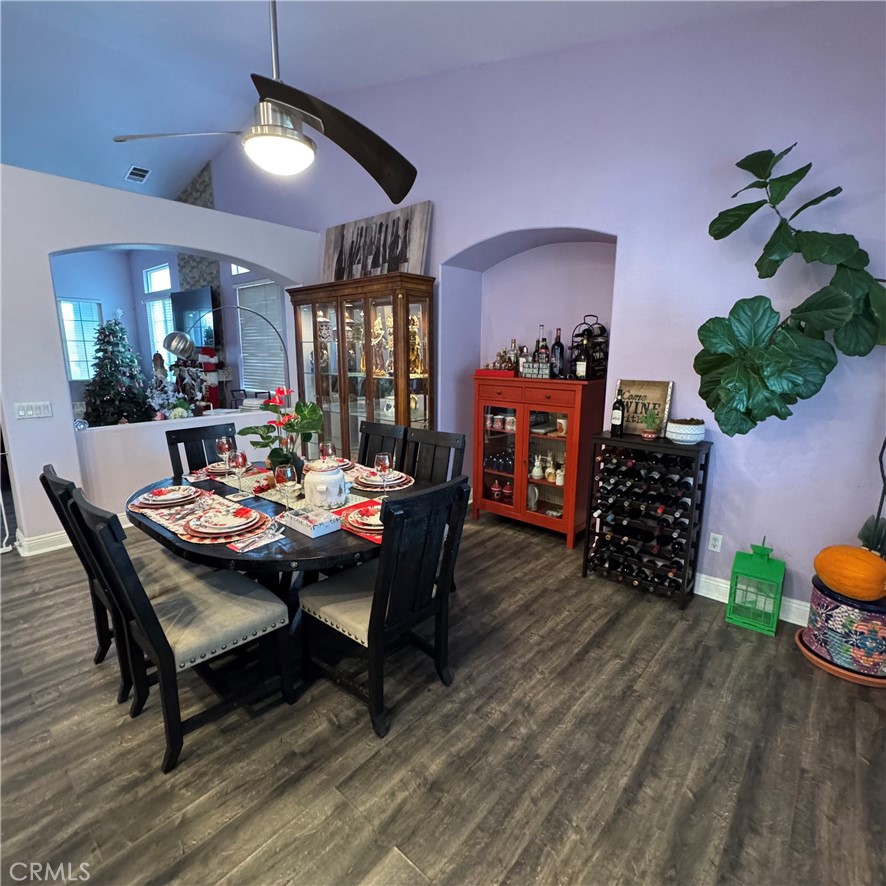 44528 Camolin Lane Lancaster, CA 93534 - Photo 64 of 75 a view of a dining room with furniture and wooden floor