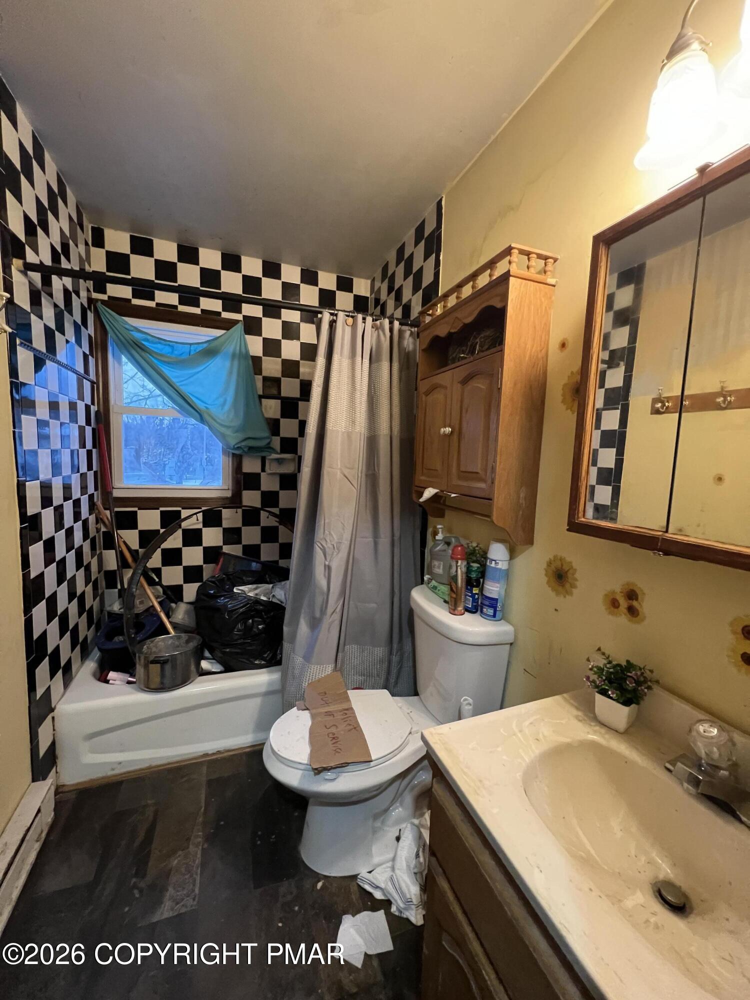 5062 Pine Ridge Road North East Stroudsburg, PA 18302 - Photo 11 of 17 a bathroom with a sink toilet and shower