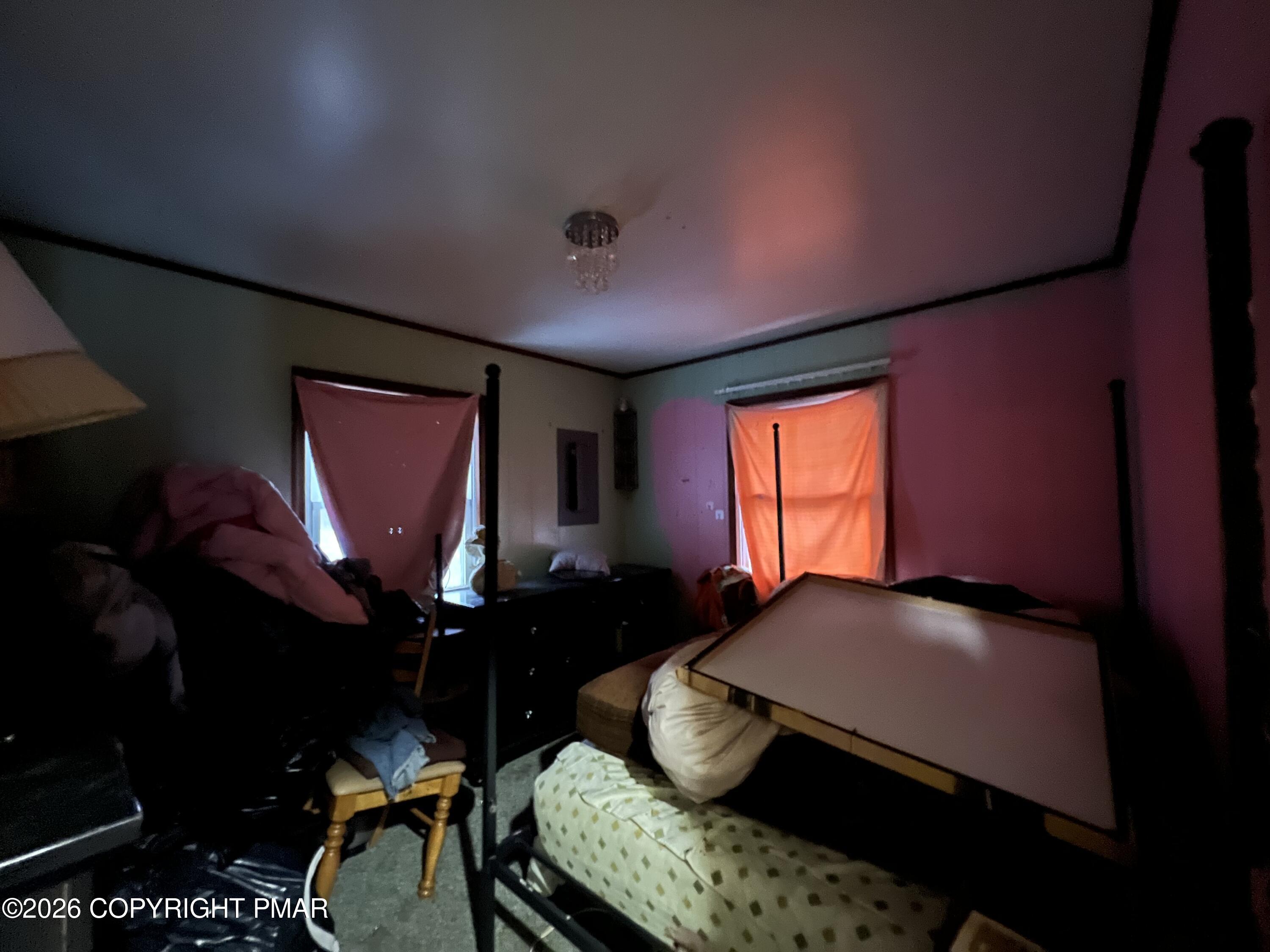 5062 Pine Ridge Road North East Stroudsburg, PA 18302 - Photo 14 of 17 a bedroom with bed and window