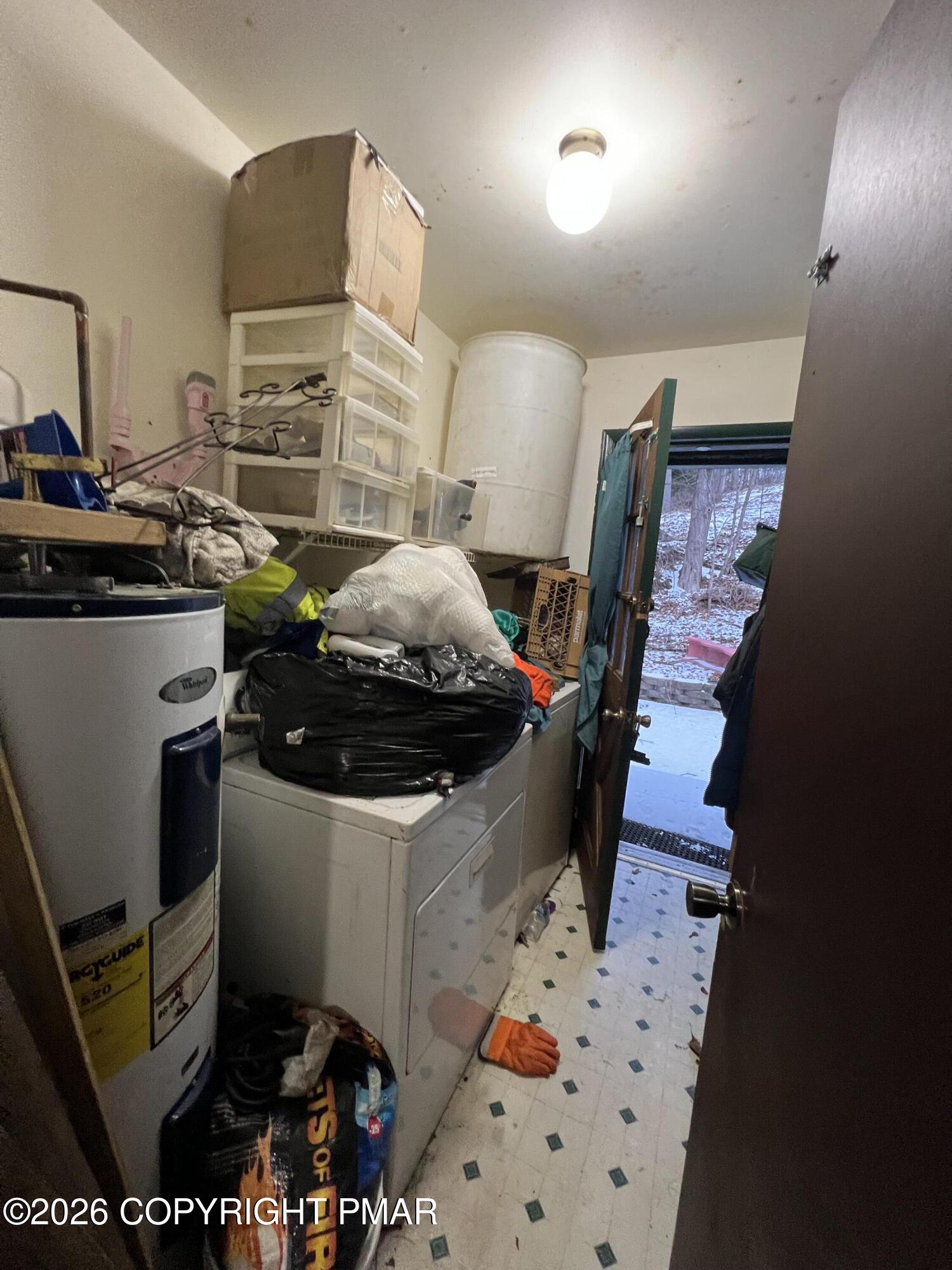5062 Pine Ridge Road North East Stroudsburg, PA 18302 - Photo 9 of 17 a kitchen with a sink appliances and cabinets
