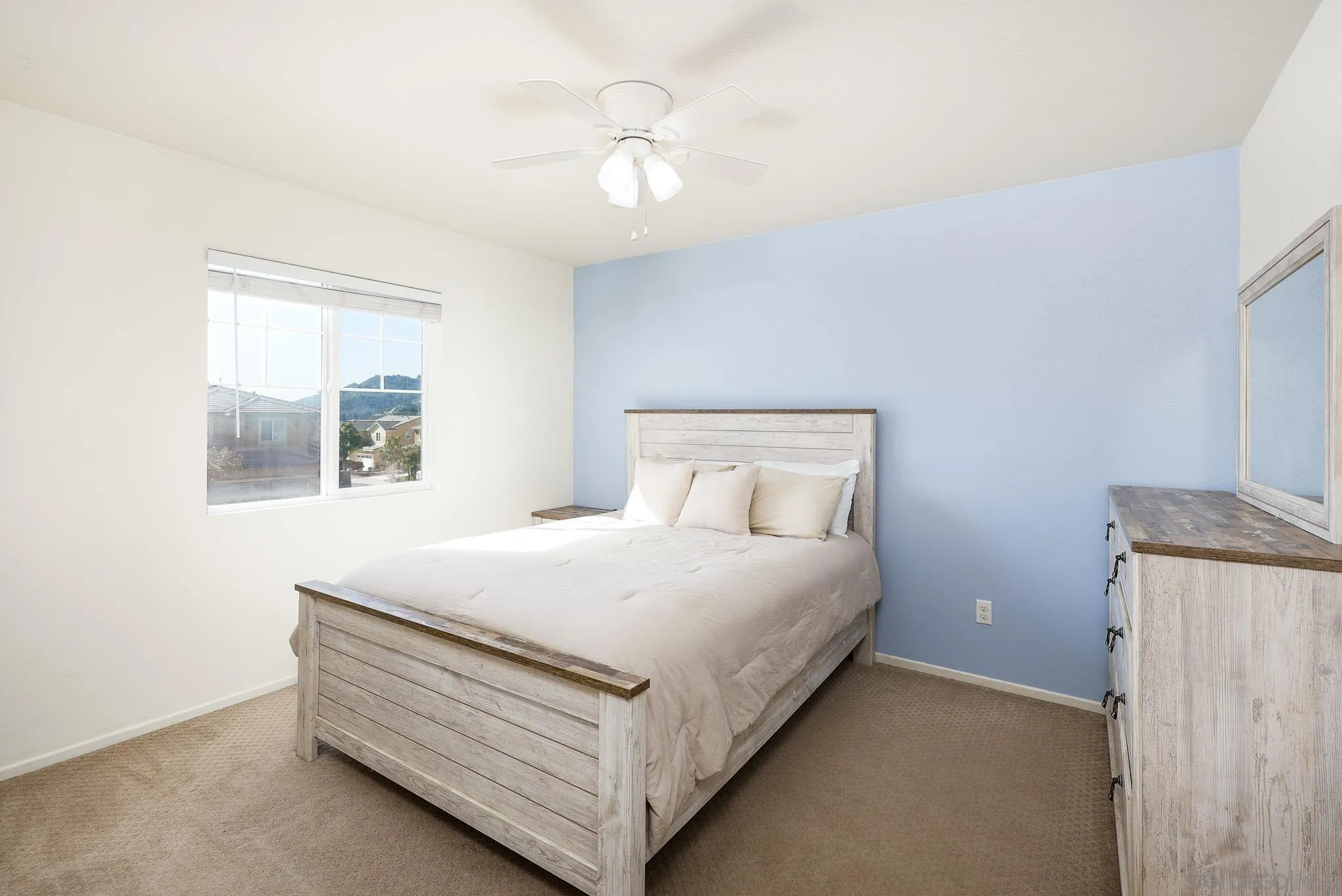 310 Falabella Lane Fallbrook, CA 92028 - Photo 28 of 48 a bedroom with a bed and window