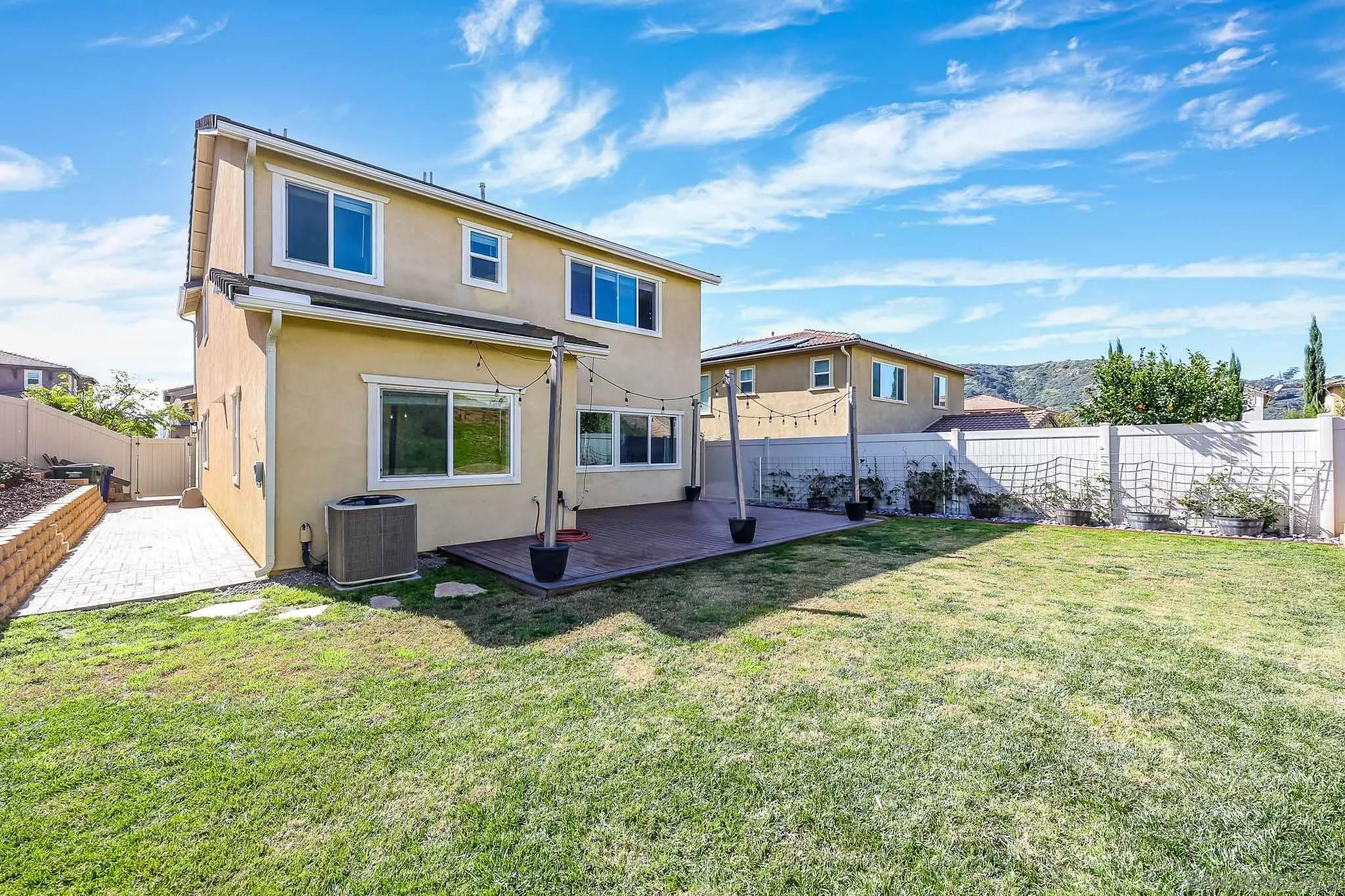310 Falabella Lane Fallbrook, CA 92028 - Photo 32 of 48 a view of an house with backyard and sitting area
