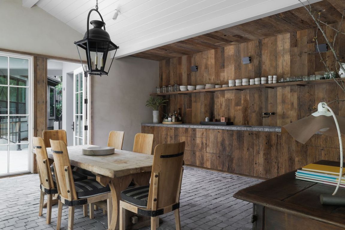 506 Konstanty Circle Austin, TX 78746 - Photo 16 of 23 a view of a dining room with furniture window and wooden floor