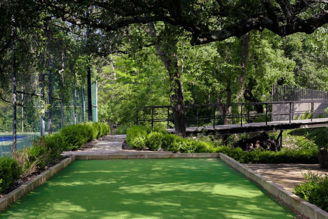 506 Konstanty Circle Austin, TX 78746 - Photo 21 of 23 a view of green field with sitting area