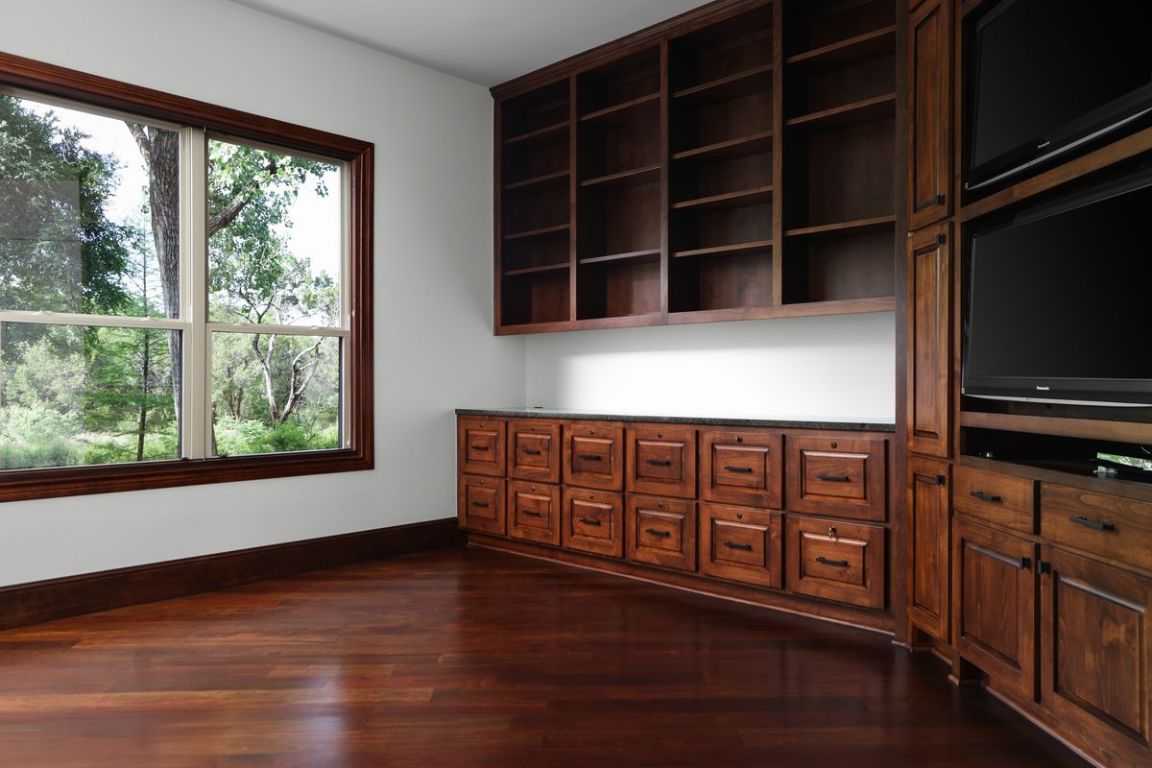 506 Konstanty Circle Austin, TX 78746 - Photo 6 of 23 a view of livingroom with furniture wooden floor and window