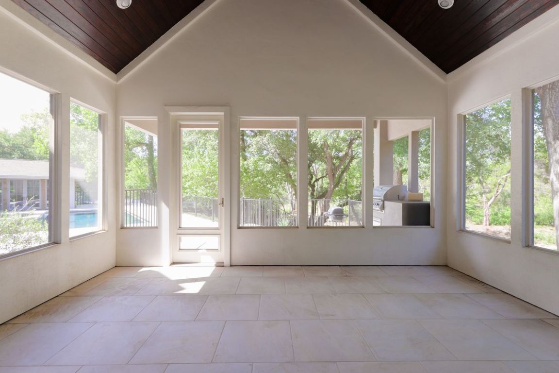 506 Konstanty Circle Austin, TX 78746 - Photo 7 of 23 a view of an empty room with a window