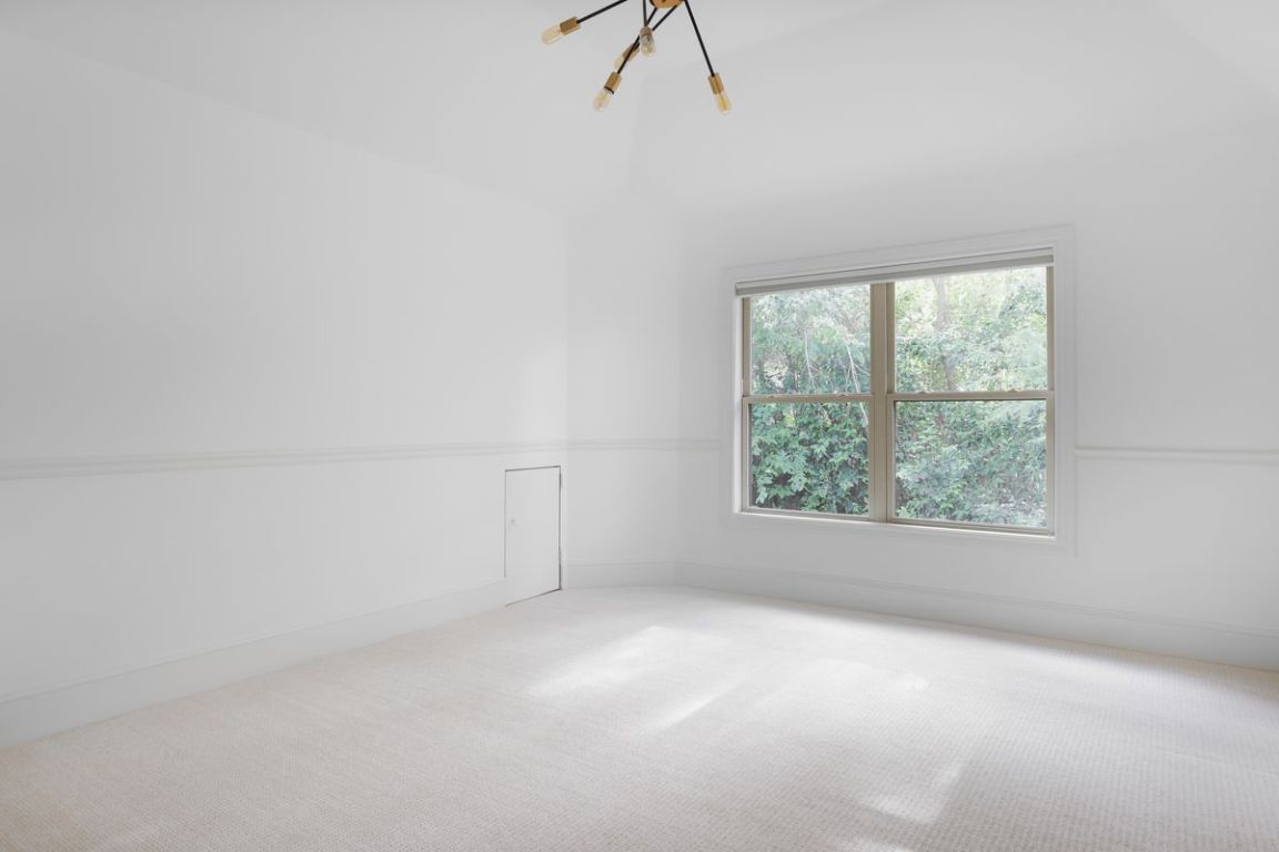 506 Konstanty Circle Austin, TX 78746 - Photo 9 of 23 an empty room with a window